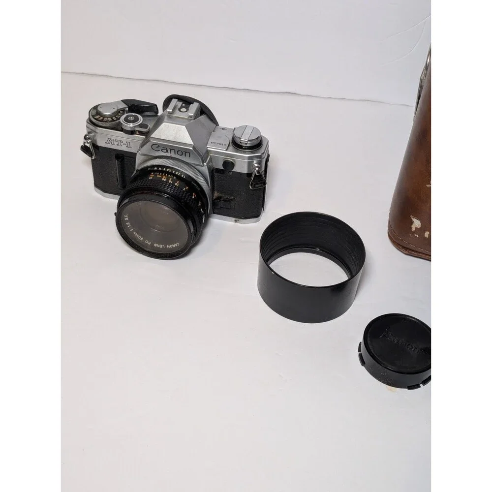 Canon AT-1 35mm Film Camera + 50mm f/1.8 Lens and Vivitar 75-205mm f/3.8 lens